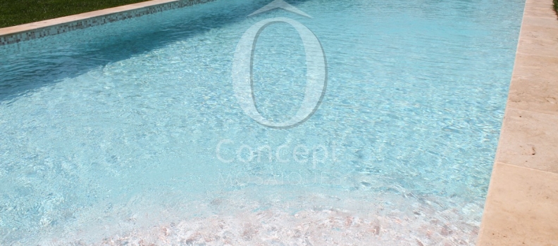 Blue swimming pool made of Rose Quartz, a mosaic tiles mix created by Ô Concept